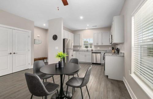 Grandville Apartment | Modern 4BR Condo with Garage, Patio & Family-Friendly Vibes