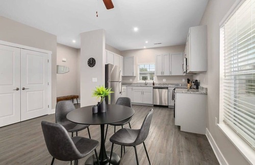 Grandville Apartment | Stylish 4BR Condo with Garage, Patio & Pet-Friendly Perks