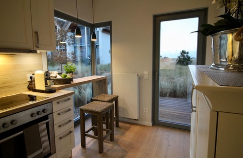 Heiligenhafen House | Stylish Thatched Cottage with Oceanfront Views & Spa Access