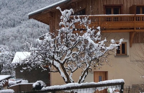 Bozel Apartment | Elegant Alpine Duplex with Mountain Views & Cozy Log Burner