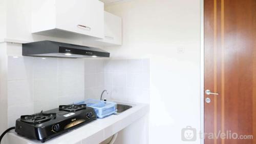 Surabaya Apartment | Cozy 2BR Retreat at Puncak Kertajaya Apartment