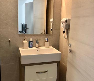 Dumbravita Apartment | Modern Apartments with Dining in Timisoara - PNM Residence