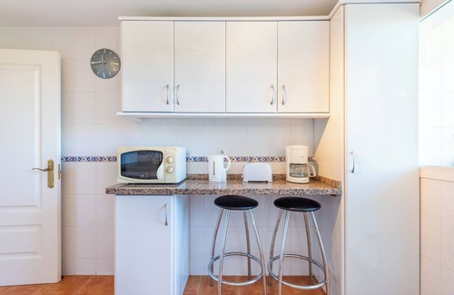 La Cala de Mijas Apartment | Modern Apartment with Ocean View, Pool & Garden Retreat