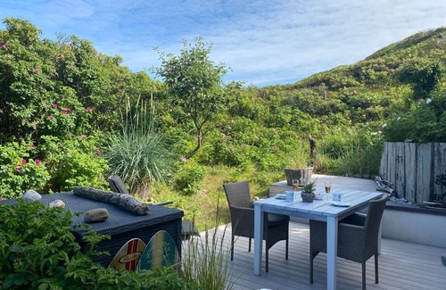 Hornum Apartment | Cozy Ocean View Apartment Steps from the Beach - House Dolphin