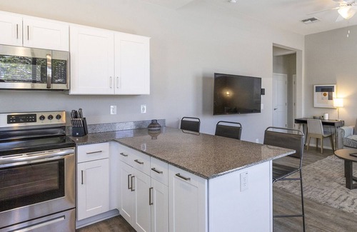 Estrella Village Apartment | Stylish Apartment with Pool in Prime Location