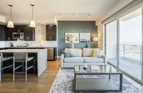 Uptown Apartment | Modern Apartment with Kitchen in Prime Location Awaits You