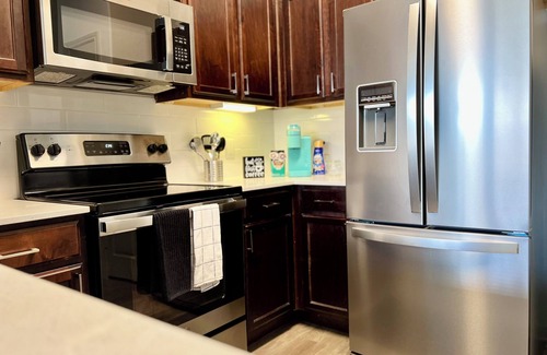 Frisco Apartment | Stylish Apartment Steps from The Star: Pool & Spa Included