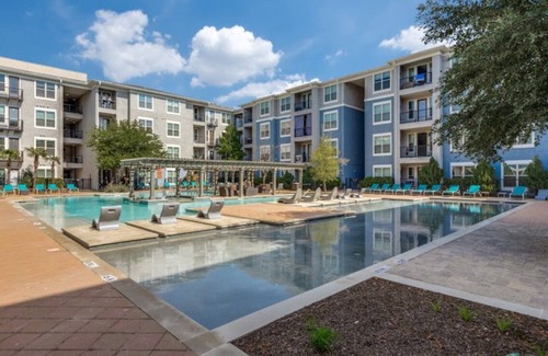 Frisco Apartment | Stylish Apartment Steps from The Star: Pool & Spa Included