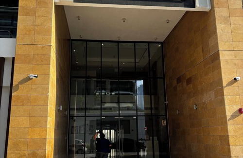 Nad Al Sheba Apartment | Modern apartment in vibrant Dubai with AC, fitness room, WiFi
