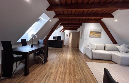 Courroux Apartment | Modern Apartment with Family-Friendly Amenities Awaits You