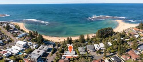 Toowoon Bay House | Modern Beach Mansion: Steps from the Ocean with Kids' Fun