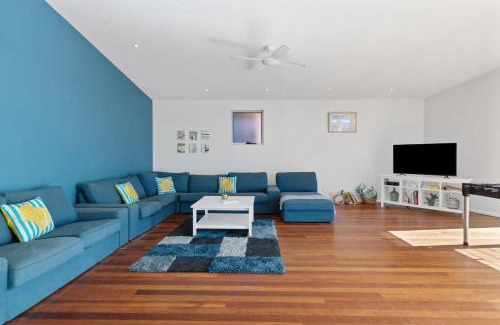 Toowoon Bay House | Modern Beach Mansion: Steps from the Ocean with Kids' Fun