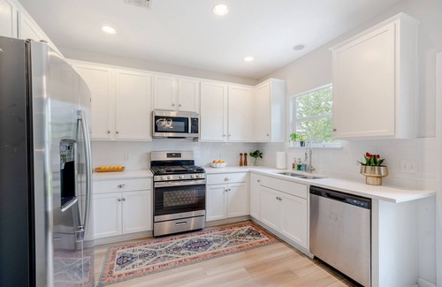 Pioneer Crossing House | Bright & Cozy Retreat with Hot Tub Near Downtown Attractions