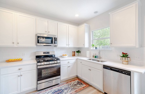 Pioneer Crossing House | Bright & Cozy Retreat with Hot Tub Near Downtown Attractions