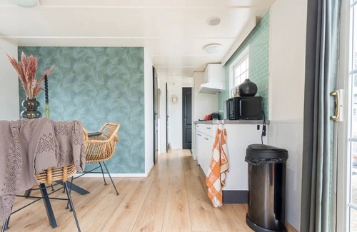 Oisterwijk Ski Chalet | Modern Chalet in Oisterwijkse Bossen with Family Amenities