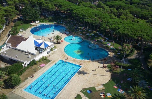 Baia Domizia Ski Chalet | Discover Belvilla by OYO: Family-Friendly Camping Retreat