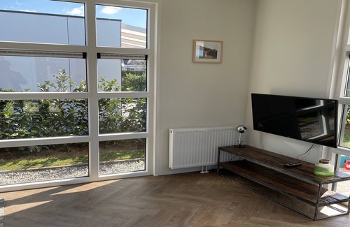 Lathum Ski Chalet | Modern Chalet in Lathum with Pool and Kitchen Amenities