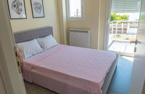 Isthmia Villa | Bright Oceanfront Villa in Corinth with Pool & Pet-Friendly