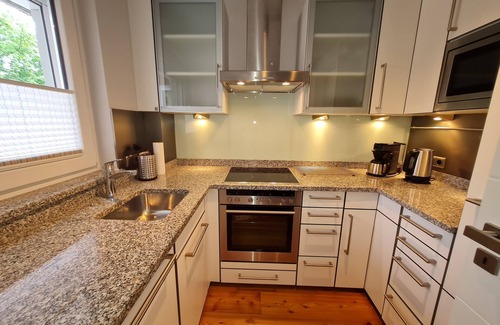 Mitte Apartment | Modern City Apartment with Balcony & Private Parking Space