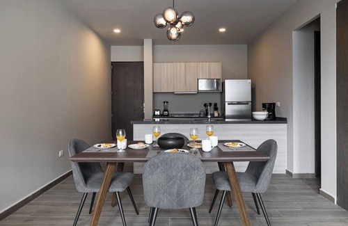Monterrey Apartment | Modern Comfort: Pool, Gym & Mountain Views!