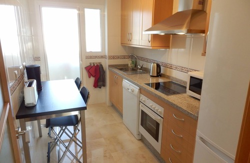 San Luis de Sabinillas Apartment | Elegant Second Floor Apartment with Ocean View Balcony