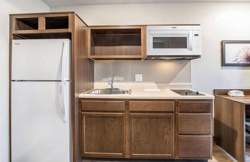 Bellflower Hotel | Unmatched Comfort in a Pet-Friendly Setting with Full Kitchen