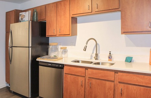 West Campus Apartment | Modern Condo With Pool, Gym, Workspaces & BBQ