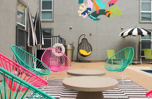 West Campus Apartment | Modern Condo With Pool, Gym, Workspaces & BBQ