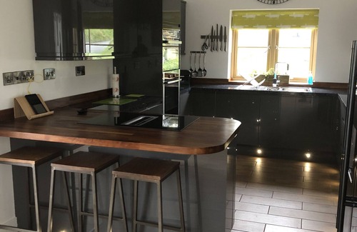 Haverfordwest Cabin | Stylish Converted Stables with Spa and Ocean Views in Pembrokeshire