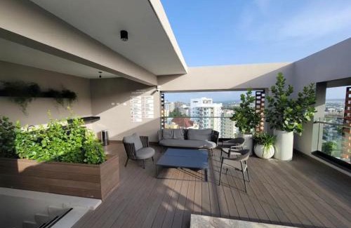 Santiago Province Apartment | Modern Luxury Condo with Rooftop Pool & Gym