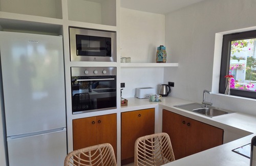 Cala Vadella Apartment | Ocean View Retreat: 9.6/10 Rated with Beachfront Amenities