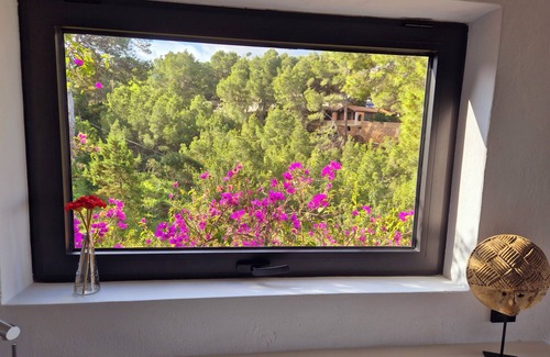 Cala Vadella Apartment | Ocean View Retreat: 9.6/10 Rated with Beachfront Amenities