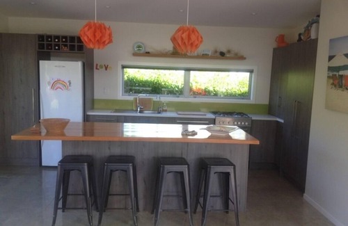 Whiritoa House | Family-Friendly Beach Retreat with Pool and Ocean View