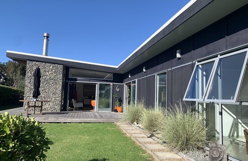 Whiritoa House | Family-Friendly Beach Retreat with Pool and Ocean View