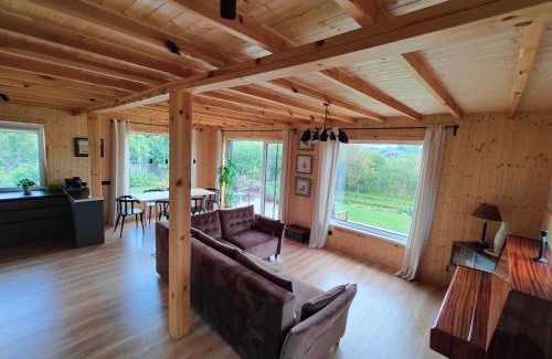 Utena county House | Modern Family-Friendly House by the Lake in Zarasai