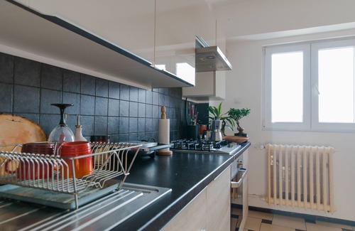 Sector 1 Apartment | Modern Flat Near Triumphal Arch with Family-Friendly Amenities