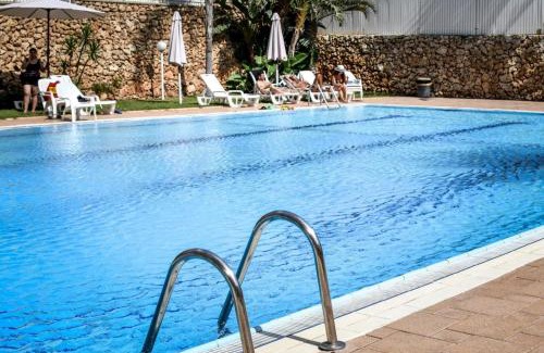 Herzliya Pituach Apartment | Relaxing Herzylia Get-A-Way with Swimming Pool and Kids' Area