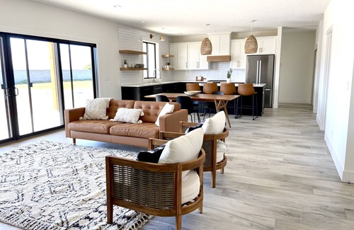 Desert Aire House | Ideal Modern Retreat with Pool, Golf & River Views!