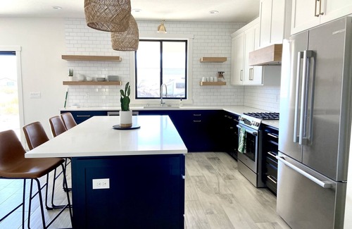 Desert Aire House | Ideal Modern Retreat with Pool, Golf & River Views!