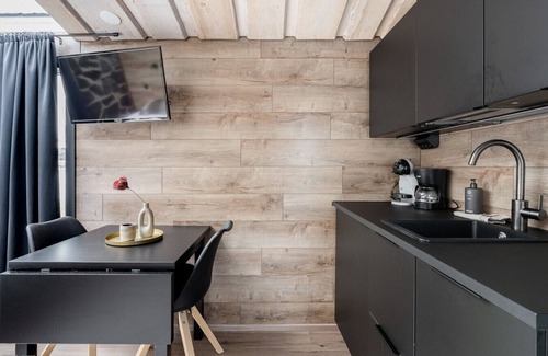 Jamsa Cabin | Modern Glass Suite on Himosranta with Lake Views