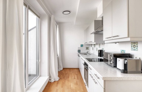 Hietzing Apartment | Modern Hietzing 1BR with Private Terrace & Garden Oasis