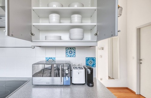 Hietzing Apartment | Modern Hietzing 1BR with Private Terrace & Garden Oasis
