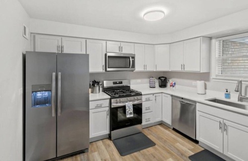 Russell House | Modern Home Near Downtown Libertyville with Garage Access