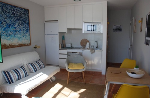 Arrieta Apartment | Oceanfront Retreat in Arrieta with Spa and Kitchen Amenities