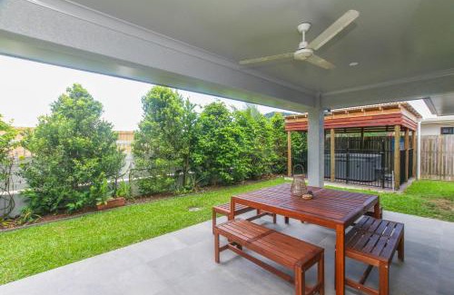Trinity Beach House | Elegant Modern Home with Private Spa & Fenced Garden
