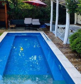 Gellert Hill Apartment | Modern Oasis with Pool and Ocean View in Central Location