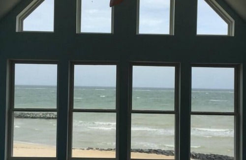 Windmill Point House | Beachfront Bliss: Modern House with Pool and Ocean Views