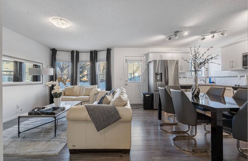 Southwest Calgary House | Stylish Retreat with Private Backyard & Hot Tub Awaits