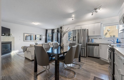 Southwest Calgary House | Stylish Retreat with Private Backyard & Hot Tub Awaits