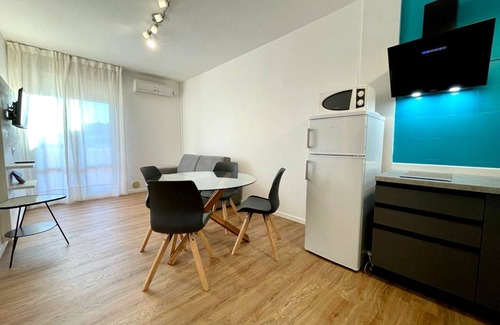 Porto Santa Margherita Apartment | Contemporary Seaview Apartment with Pool and Pet-Friendly Perks